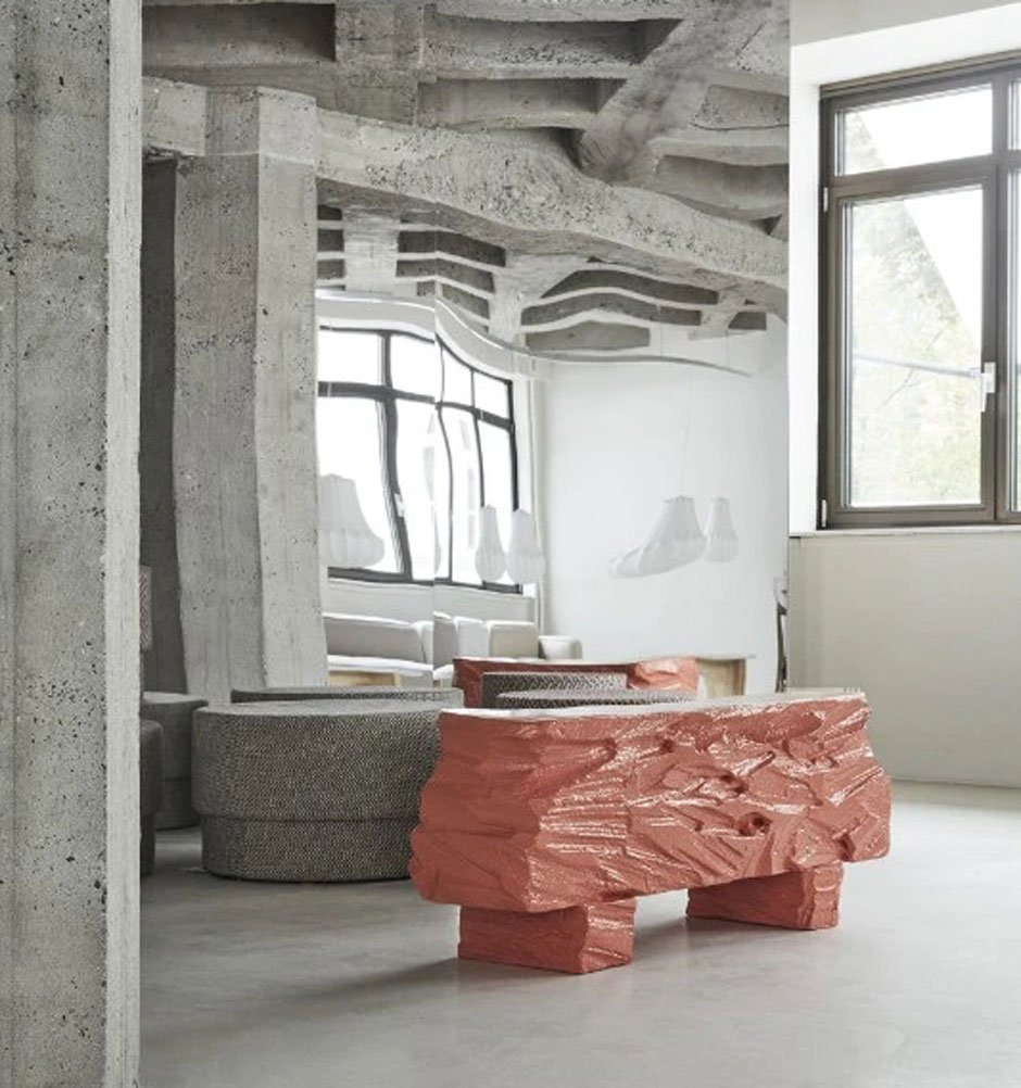 The new Normann Copenhagen headquarters is a dialogue of rough concrete and pastel colors