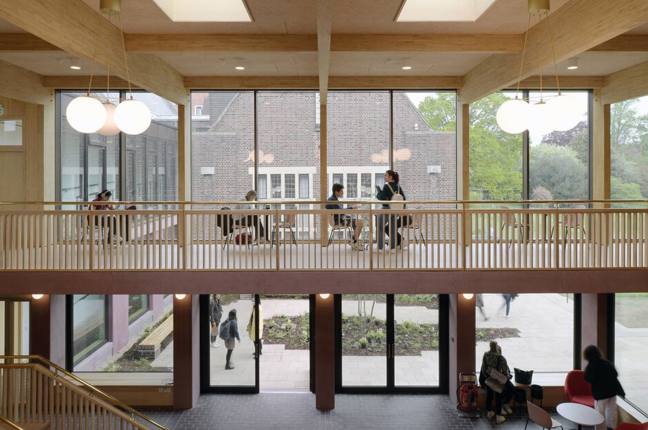 Feilden Fowles completes the timber-framed dining hall at the University of Cambridge