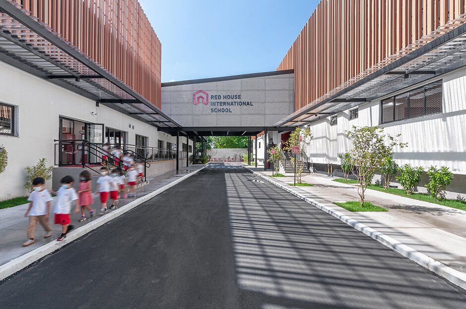 Studio Dlux converts industrial buildings into Red House School in São Paulo