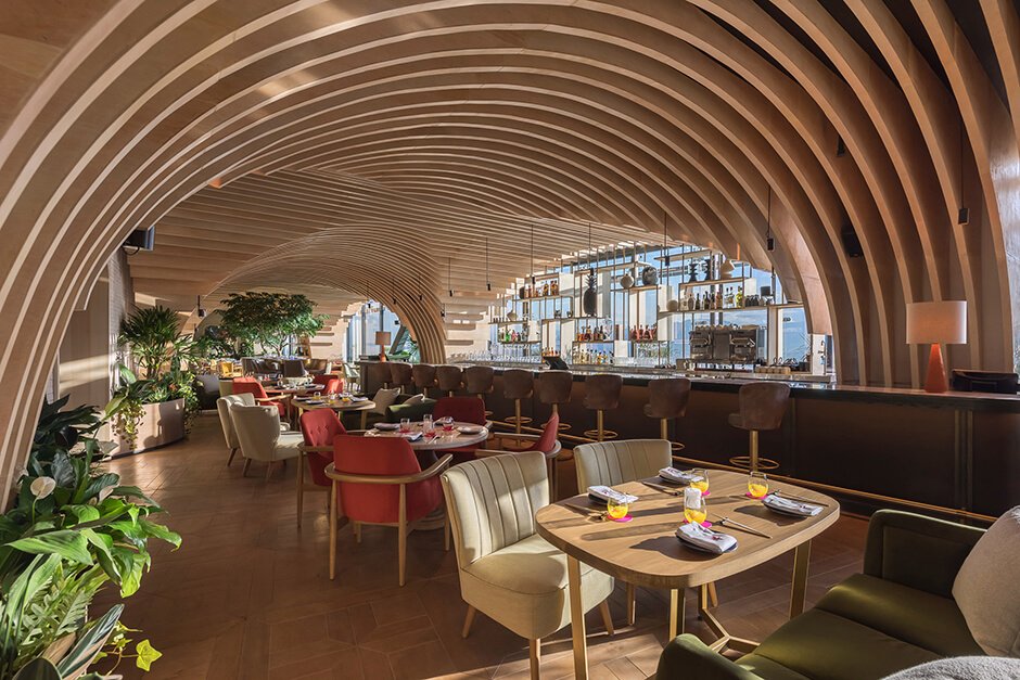 Sordo Madaleno Arquitectos creates an alfresco feeling inside Mexico City skyscraper restaurant